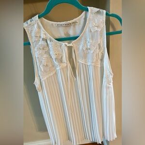 Alice + Olivia Top with Floral Embroidery and pearl appliqué.